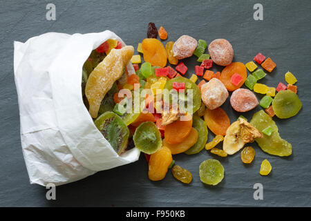 Candied dried mixed assortment of exotic fruits in the bag Stock Photo