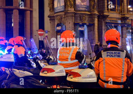 Brussels, Belgium. 13th Dec, 2015. Belgian police prepares to protect defile of Christmas parade on 13 December, 2015 in Brussels, Belgium Credit:  Skyfish/Alamy Live News Stock Photo
