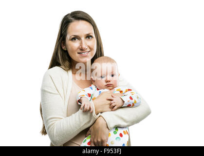 Smiling mother holding a baby in her arms isolated on white background Stock Photo