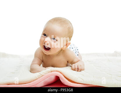 Smiling baby lying on a floor isolated on white background Stock Photo