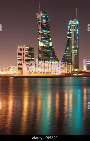 Bahrain Financial Harbour Towers at night Stock Photo