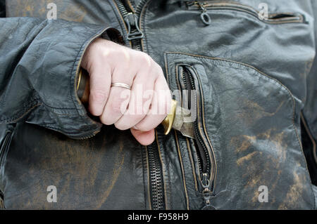 Pulling Knife Out Stock Photo