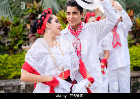 Young people in folkloristic costumes - Puerto Vallarta, Jalisco, Mexico. Xiutla Dancers - a folkloristic Mexican dance group in Stock Photo