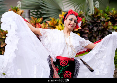 Woman dancing - Puerto Vallarta, Jalisco, Mexico. Xiutla Dancers - a folkloristic Mexican dance group in traditional costumes re Stock Photo