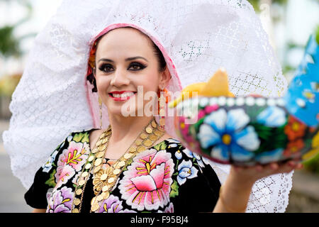 Portrait of young woman smiling. Puerto Vallarta, Jalisco, Mexico. Xiutla Dancers - a folkloristic Mexican dance group in tradit Stock Photo