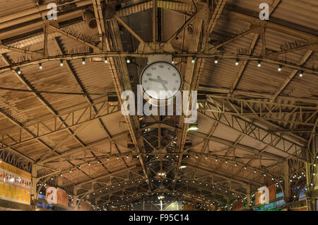 Wooden ceiling on a big hall with a clock, in  market place, Antibes, France Stock Photo