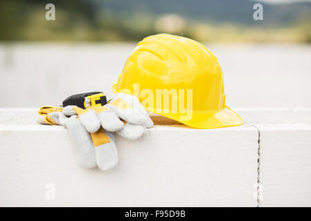 Image of engineer workplace with blueprint, hardhat and measuring tools Stock Photo