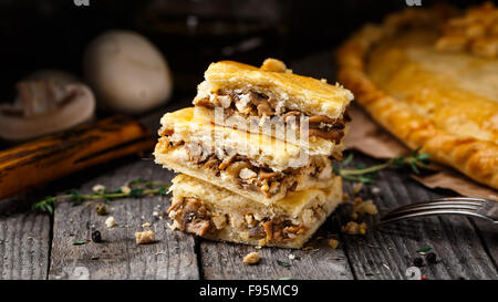 Homemade pie stuffed with mushrooms Stock Photo