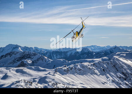 Helicopter, Heliskiing, Selkirk Mountains, Selkirk Tangiers Heli Skiing, Revelstoke, British Columbia, Canada, Stock Photo