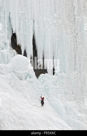 The Weeping wall in winter with ice climber, Icefields Parkway, Banff National Park, Alberta, Canada Stock Photo