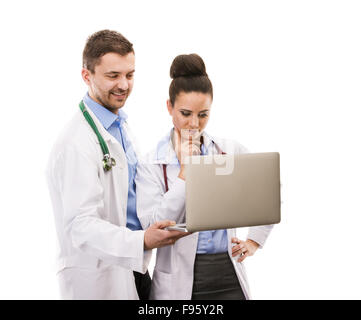 Happy medical team of doctors, man and woman, isolated over white background Stock Photo