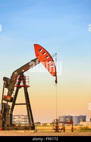 Oil pump jack in the Bakken oil field, near Estevan, Saskatchewan, Canada Stock Photo