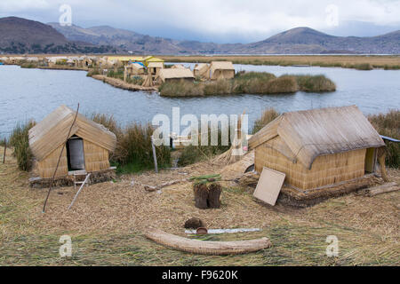 Local residents of floating reed islands of Uros, Lake Titicaca, Peru Stock Photo