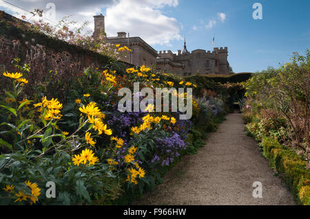 A colourful herbaceous border flowering in early October within the walled garden of Rousham House in Oxfordshire, England Stock Photo