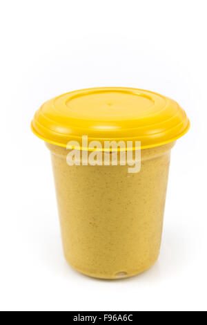 Plastic pot of  mustard isolated on white Stock Photo