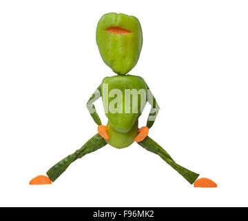 Funny green ninja made of fresh vegetables on isolated background Stock Photo