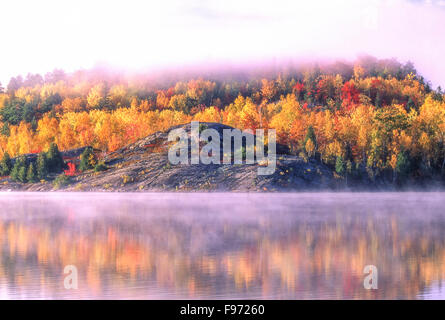 Foggy morning, Simon Lake in autumn, Naughton, City of Greater Sudbury, Ontario, Canada Stock Photo