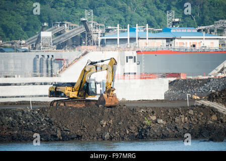 PANAMA CANAL, Panama--The construction site of the new locks being build adjacent to the existing Miraflores Locks on the Panama Canal in Panama City, Panama. Opened in 1914, the Panama Canal is a crucial shipping lane between the Atlantic and Pacific Oceans that mean that ships don't have to go around the bottom of South America or over the top of Canada. The Canal was originally built and owned by the United States but was handed back to Panama in 1999. Stock Photo