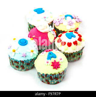 Colorful Cupcakes isolated on white background Stock Photo