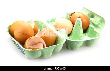 Broken egg shells in cardboard egg box Stock Photo