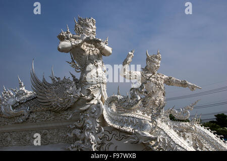 Wat Rong Khun, the White Temple, in Chaing Rai, Thailand, designed and built by artist Chalermchai Kositpipat Stock Photo