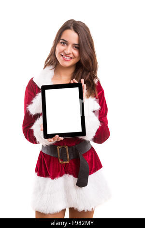 Young woman dress in Christmas costume, presenting your product Stock Photo