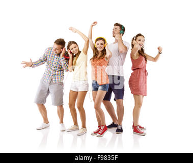 Group of young people listening to the music, isolated on white background. Stock Photo