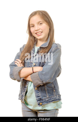 a portrait of a little girl standing with folded hands over white background Stock Photo