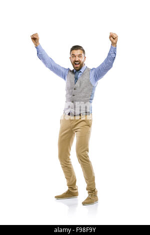 Studio shot of modern hipster businessman celebrating his business success, isolated on white background Stock Photo