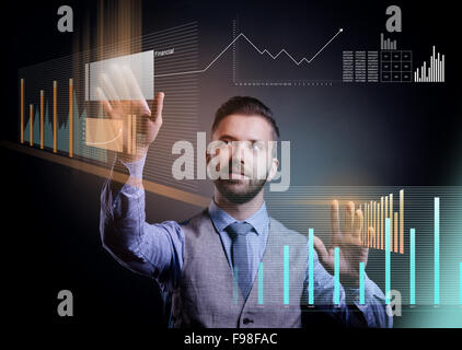 Hipster businessman working on digital virtual screen and business strategy as concept, isolated on black background Stock Photo