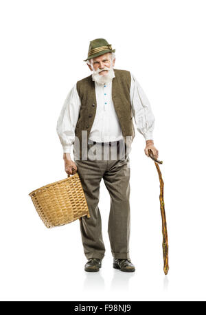 Old bearded farmer man in hat holding basket, isolated on white background Stock Photo