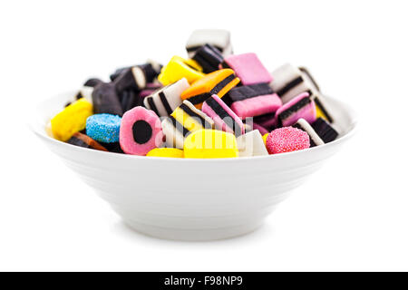 Liquorice Allsorts  in a bowl isolated on a white background Stock Photo