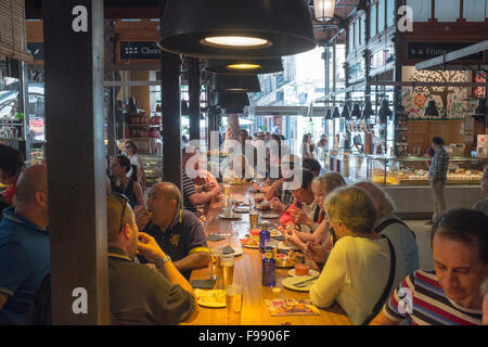 Diners at Mercado San Miguel in Madrid Stock Photo