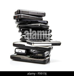 Pile of old mobile phones ready for recycling Stock Photo