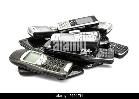 Pile of old mobile phones ready for recycling Stock Photo