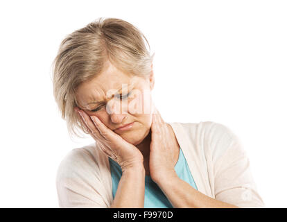 Senior woman suffering from toothache, isolated on white background Stock Photo