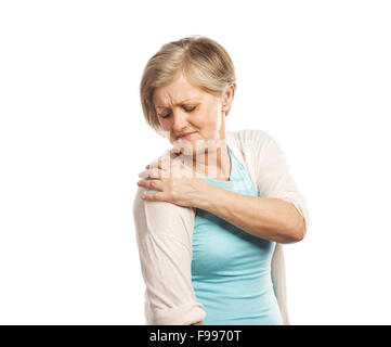 Senior woman with shoulder pain, isolated on white background Stock Photo