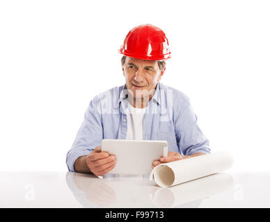 Portrait Of Happy Senior Engineer Holding Digital Tablet And Plans Isolated Over White Background Stock Photo