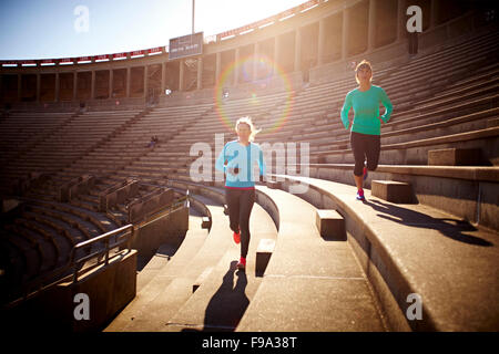 working out on the stairs of the Harvard University Stadium Stock Photo