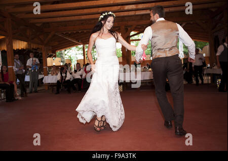 Bride and groom dancing at the wedding reception Stock Photo