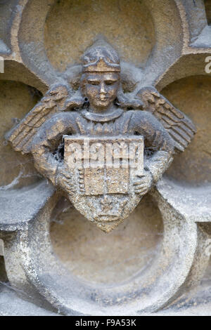 Stone Angel Holding a Shield Stock Photo