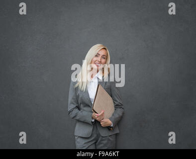 Portrait of a happy business woman smiling Stock Photo