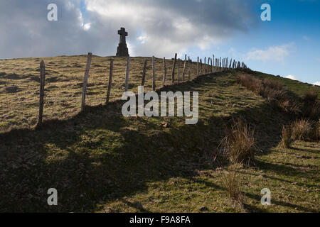 Croos and fence in Saibi mountain, Basque Country Stock Photo