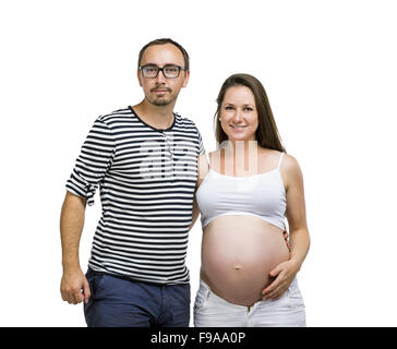 Portrait of young pregnant couple posing in studio, isolated on white background Stock Photo