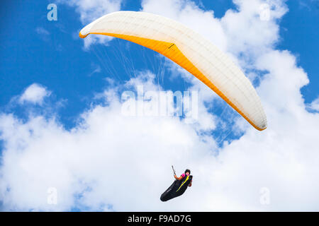 Burgas, Bulgaria - July 23, 2014: Amateur paraglider in blue sky Stock Photo