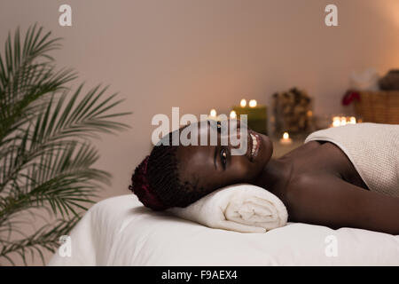 Spa African Woman in Beauty Salon Relaxing Stock Photo