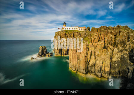 Neist Point lighthouse at Isle of Skye, Scottish highlands, United Kingdom. Long exposure Stock Photo