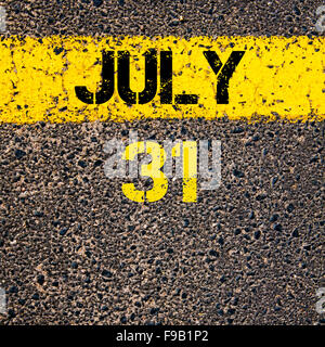 31 July calendar day written over road marking yellow paint line Stock Photo