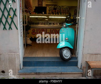 AJAXNETPHOTO. 2015. ROME, ITALY. - VESPA SCOOTER - PARKED IN THE DOORWAY OF A GELATI - ICE CREAM - SHOP IN THE CITY CENTRE. PHOTO:JONATHAN EASTLAND/AJAX REF:GX151012 75889 Stock Photo
