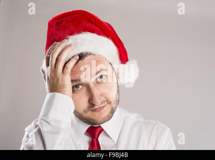 Handsome christmas man is posing in studio Stock Photo